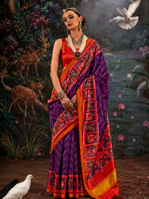 Royal Purple & Crimson Red Patola Silk Saree with Intricate Ikat Motifs Royal Purple & Crimson Red Patola Silk Saree with Intricate Ikat Motifs