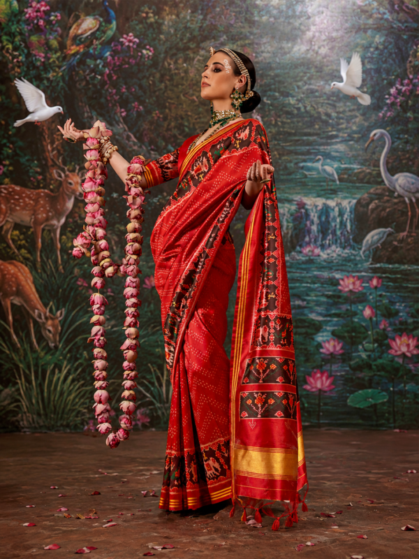 Scarlet Red Patola Silk Saree with Intricate Ikat Motifs Scarlet Red Patola Silk Saree with Intricate Ikat Motifs